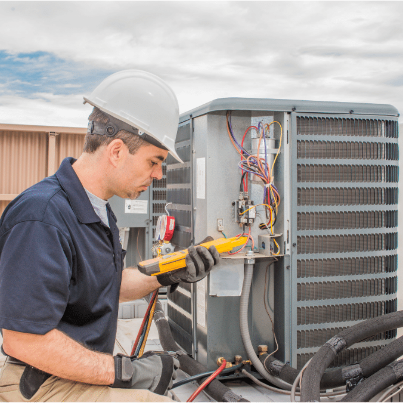 Seaforth Heating & Cooling HVAC technician servicing a system
