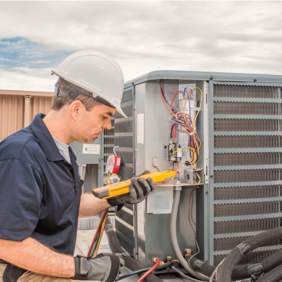 Seaforth Heating & Cooling HVAC technician servicing a system
